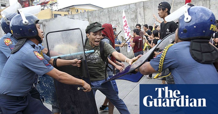 Viral-Video-Shows-SWAT-Officer-Dragging-Boy-Amid-Protest-Disturbance-in-Manila